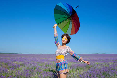 Beautiful girl on the lavender fieldの写真素材