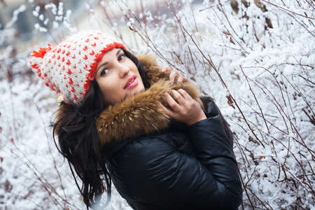 Young woman in the winter parkの写真素材