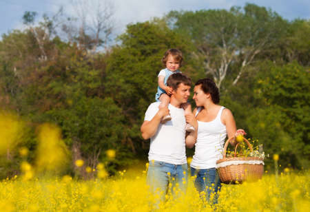 Family on the meadowの写真素材