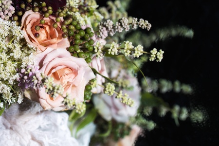 Rose bridal bouquet on black backgroundの写真素材
