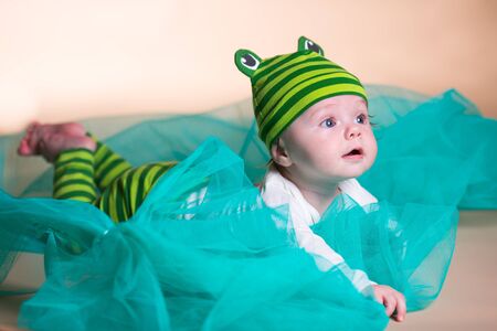 Little boy lying in studioの写真素材