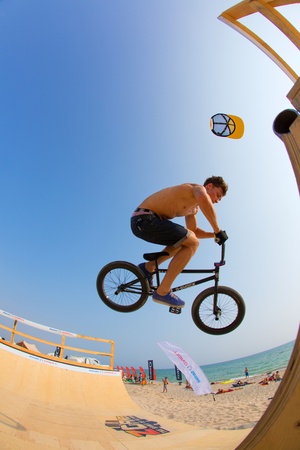 POPOVKA, UKRAINE - AUGUST 14. Racer Anton Evstifeev on competition of BMX "Z-Games Spirit of action 2013" on august 14, 2013 in Popovka, Ukraineのeditorial素材