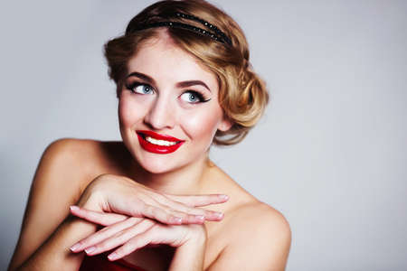 Retro-styled woman portrait in studio