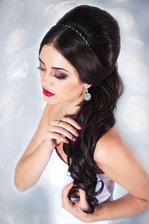 Young attractive bride portrait in studio