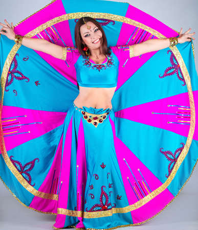 Indian woman dancing in national clothesの写真素材