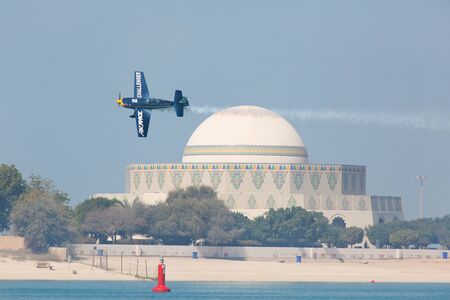 ABU-DHABI, UNITED ARABIAN EMIRATES - FEBRUARY 14 . Racing airplane at the stage of redbull airrace competition on february 14, 2015 in Abu-Dhabi, United Arabian Emiratesのeditorial素材