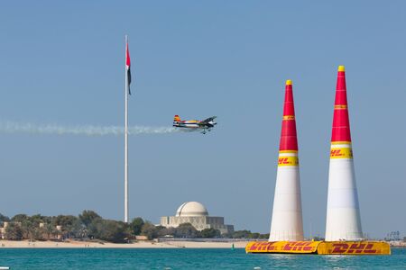 ABU-DHABI, UNITED ARABIAN EMIRATES - FEBRUARY 14 . Racing airplane at the stage of redbull airrace competition on february 14, 2015 in Abu-Dhabi, United Arabian Emiratesのeditorial素材