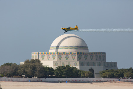 ABU-DHABI, UNITED ARABIAN EMIRATES - FEBRUARY 14 . Racing airplane at the stage of redbull airrace competition on february 14, 2015 in Abu-Dhabi, United Arabian Emiratesのeditorial素材