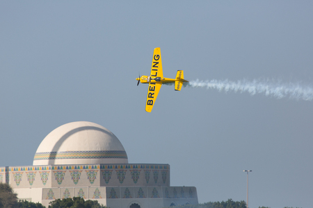ABU-DHABI, UNITED ARABIAN EMIRATES - FEBRUARY 14 . Racing airplane at the stage of redbull airrace competition on february 14, 2015 in Abu-Dhabi, United Arabian Emiratesのeditorial素材