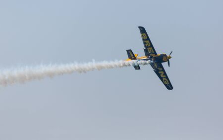 ABU-DHABI, UNITED ARABIAN EMIRATES - FEBRUARY 14 . Racing airplane at the stage of redbull airrace competition on february 14, 2015 in Abu-Dhabi, United Arabian Emiratesのeditorial素材