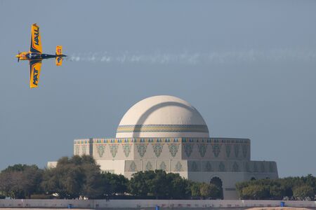 ABU-DHABI, UNITED ARABIAN EMIRATES - FEBRUARY 14 . Racing airplane at the stage of redbull airrace competition on february 14, 2015 in Abu-Dhabi, United Arabian Emiratesのeditorial素材