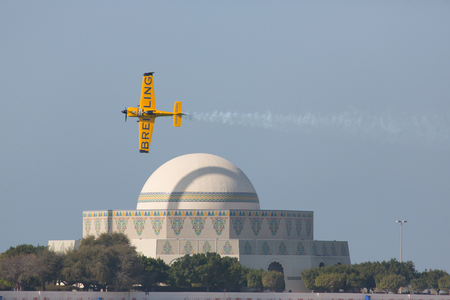 ABU-DHABI, UNITED ARABIAN EMIRATES - FEBRUARY 14 . Racing airplane at the stage of redbull airrace competition on february 14, 2015 in Abu-Dhabi, United Arabian Emiratesのeditorial素材