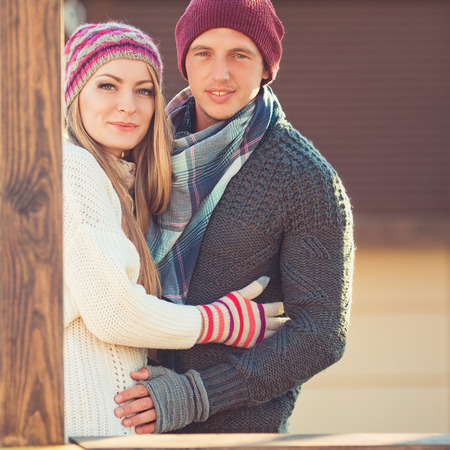 Young beautiful couple outdoors autumn portraitの写真素材