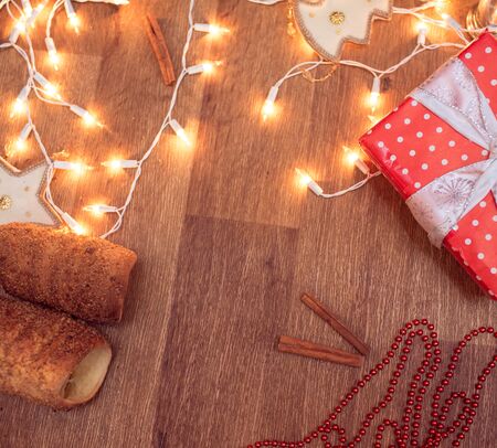 Traditional Slovak cake Trdelnik photo with christmas garlandの写真素材