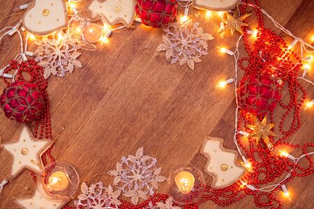 Backgroung of christmas garland lights on the wooden floorの写真素材