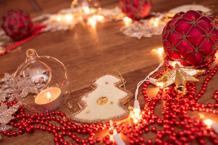 Backgroung of christmas garland lights on the wooden floorの写真素材