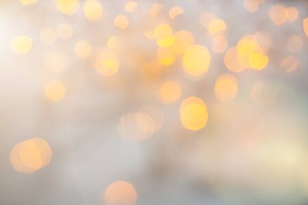 Gold christmas lights background, blured  yellow garlandの写真素材