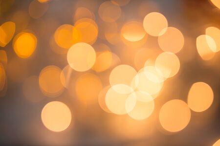 Gold christmas lights background, blured  yellow garlandの写真素材