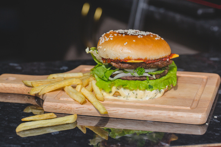 fresh tasty burger and french friesの写真素材