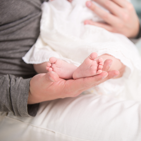 Father and his newborn daughter. family portraitの写真素材