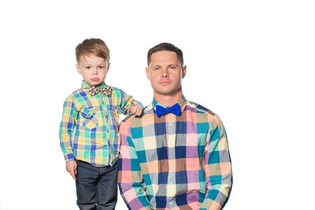 Happy father and son play isolated on white in studioの写真素材