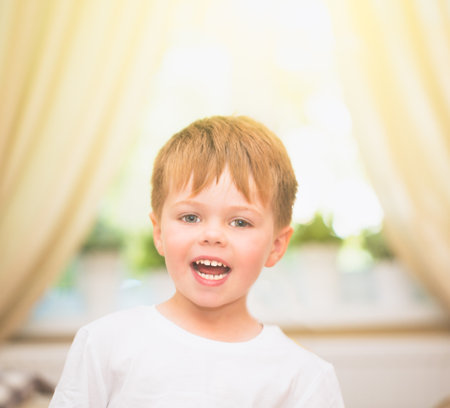 Happy 2 years old baby boy. Kid is smiling, at homeの写真素材