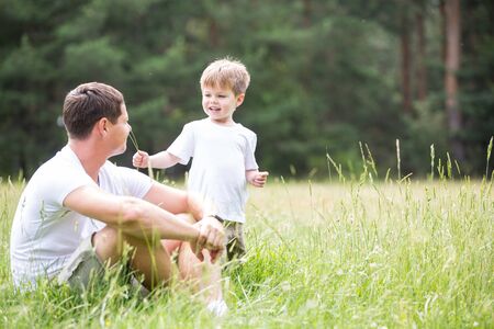 Father and son relationship, playing in the Parkの写真素材