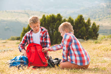two cute boy at the mountain. family conceptの写真素材