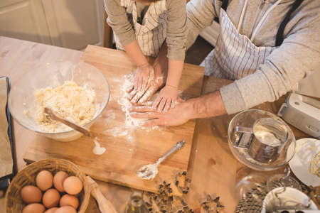 A father and his son cookingの写真素材
