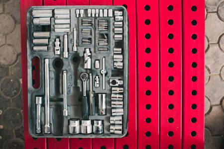 A set of tools in an old working suitcase. All for repairの写真素材