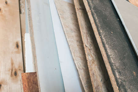 Different sheets of plywood and wood in the production warehouseの写真素材
