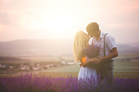 Beautiful couple on the lavender fieldの写真素材