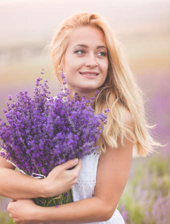 Beautiful girl on the lavender field