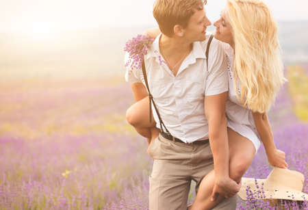 Beautiful couple on the lavender fieldの写真素材