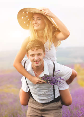 Beautiful couple on the lavender fieldの写真素材