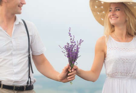 Beautiful couple on the lavender fieldの写真素材