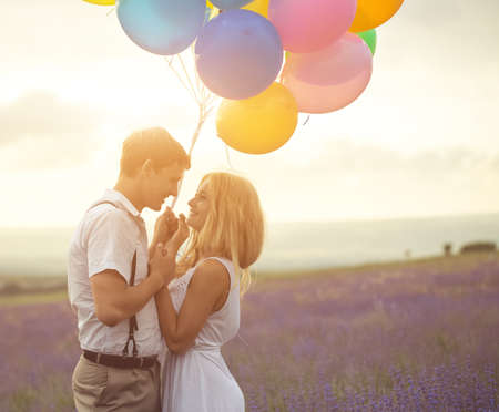 Beautiful couple on the lavender fieldの写真素材