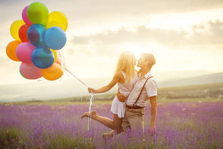 Beautiful couple on the lavender fieldの写真素材