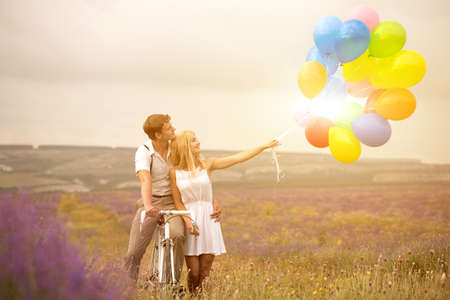 Beautiful couple on the lavender fieldの写真素材