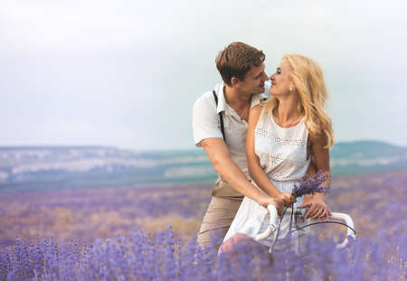 Beautiful couple on the lavender fieldの写真素材