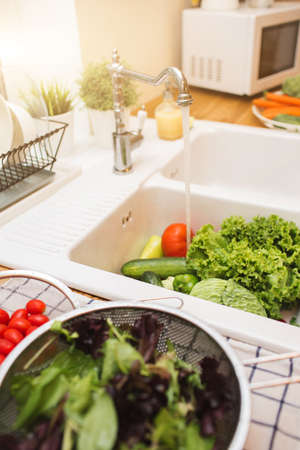 Lots of fresh vegetables for salad preparingの写真素材