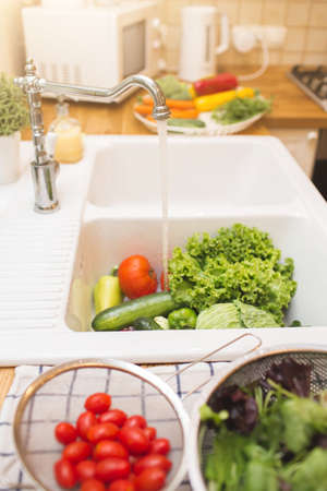 Lots of fresh vegetables for salad preparingの写真素材