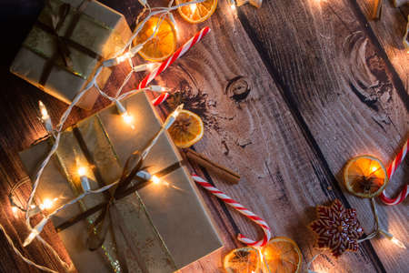 Christmas frame with lights, ornaments, candy and decorations. Free spaceの写真素材