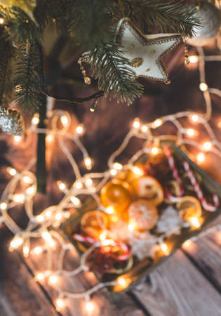Christmas background with lights, ornaments, candy and decorations. Free spaceの写真素材