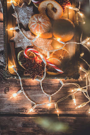 Christmas background with lights, ornaments, candy and decorations. Free spaceの写真素材