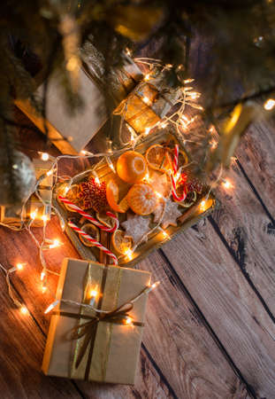 Christmas background with lights, ornaments, candy and decorations. Free spaceの写真素材