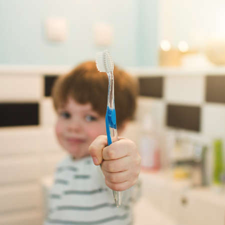 Little boy brushing teethの写真素材