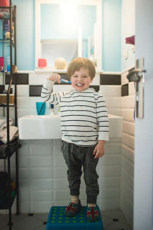 Little boy brushing teethの写真素材