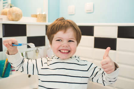 Little boy brushing teethの写真素材