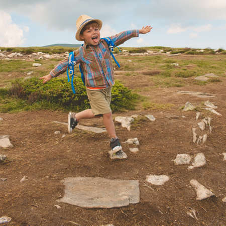 Little boy traveling in Rila mountains Bulgariaの写真素材